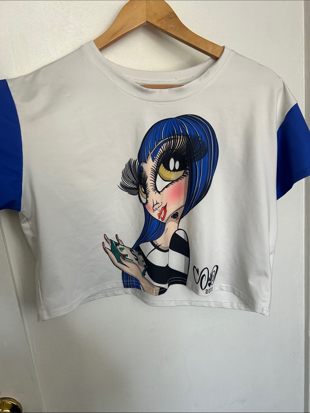 White & Blue Graphic Crop Tee with Cartoon Illustration Sandoner Stacks Tee